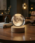 Moon design 3D crystal globe night light on a wooden table